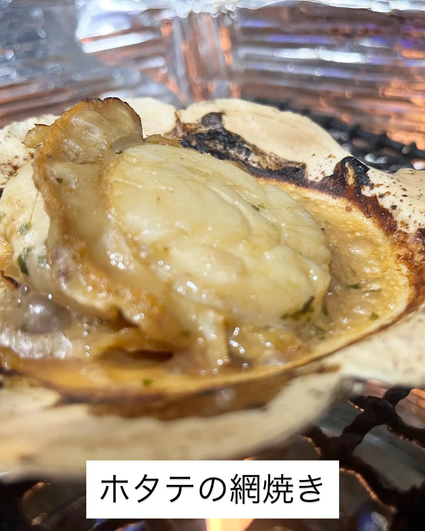 とろける旨みが広がる、定番人気メニューのホタテのバター醤油焼...